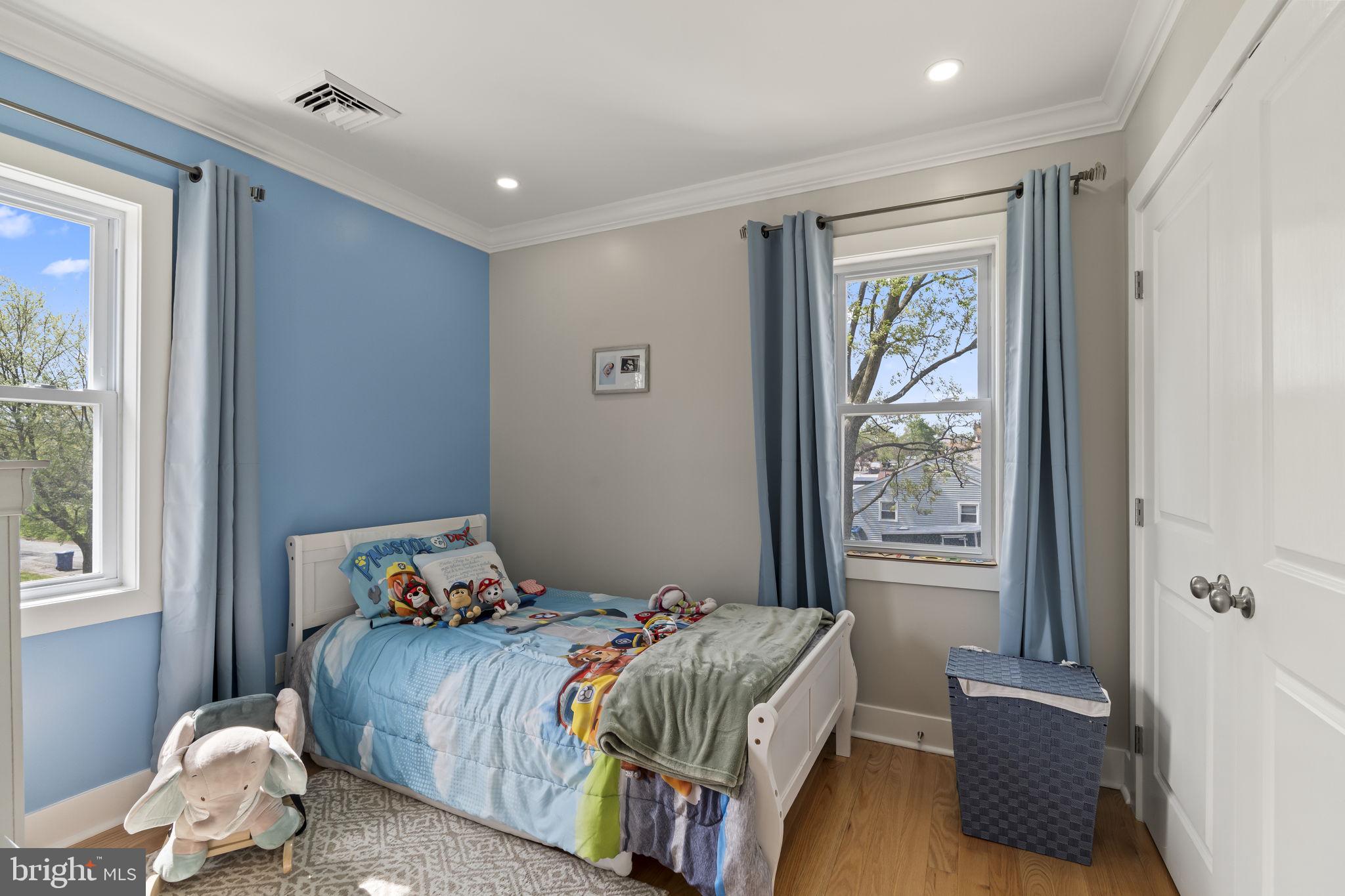 1901 Jackson Street Cinnaminson, NJ 08077 - Photo 21 of 40 a bedroom with a bed and a window