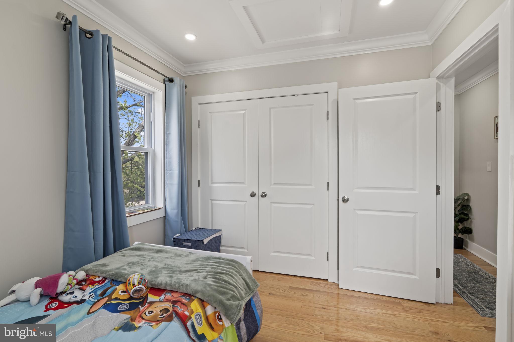 1901 Jackson Street Cinnaminson, NJ 08077 - Photo 22 of 40 a bedroom with a bed and a window
