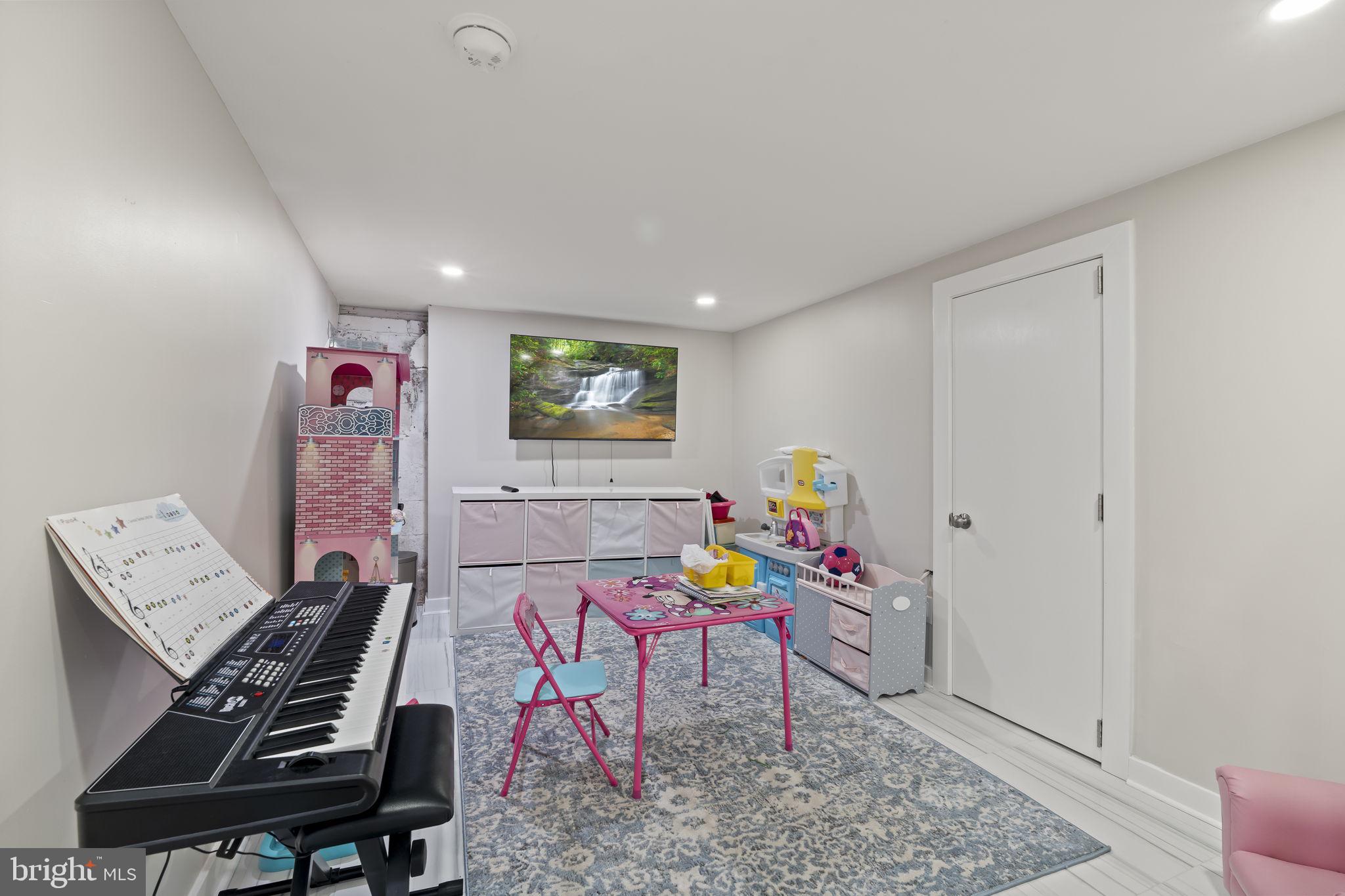 1901 Jackson Street Cinnaminson, NJ 08077 - Photo 27 of 40 a workspace with furniture and toys