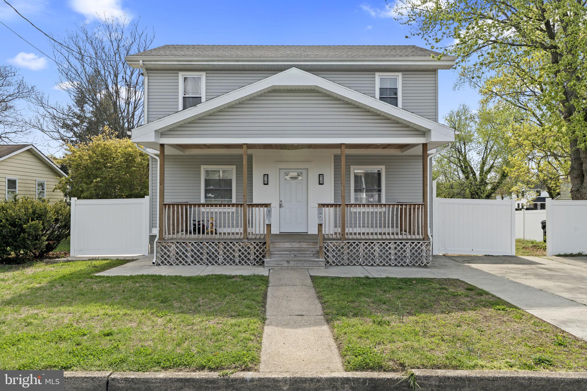 1901 Jackson Street Cinnaminson, NJ 08077 - Photo 39 of 40 a front view of a house with garden