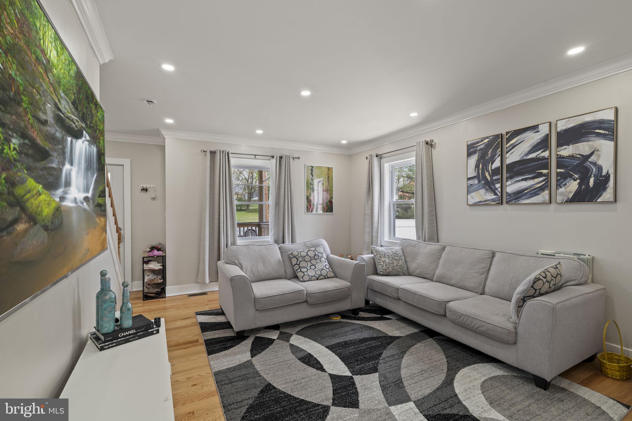 1901 Jackson Street Cinnaminson, NJ 08077 - Photo 10 of 40 a living room with furniture and a couch