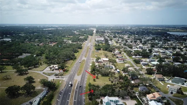 an aerial view of a city with lots of residential buildings