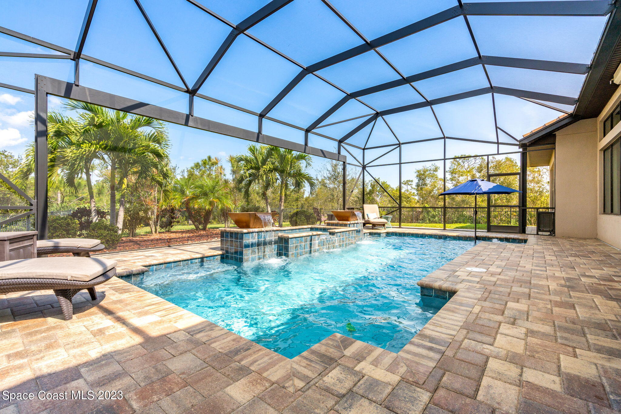 5530 Calder Drive Melbourne, FL 32940 - Photo 38 of 63 a view of swimming pool with a patio