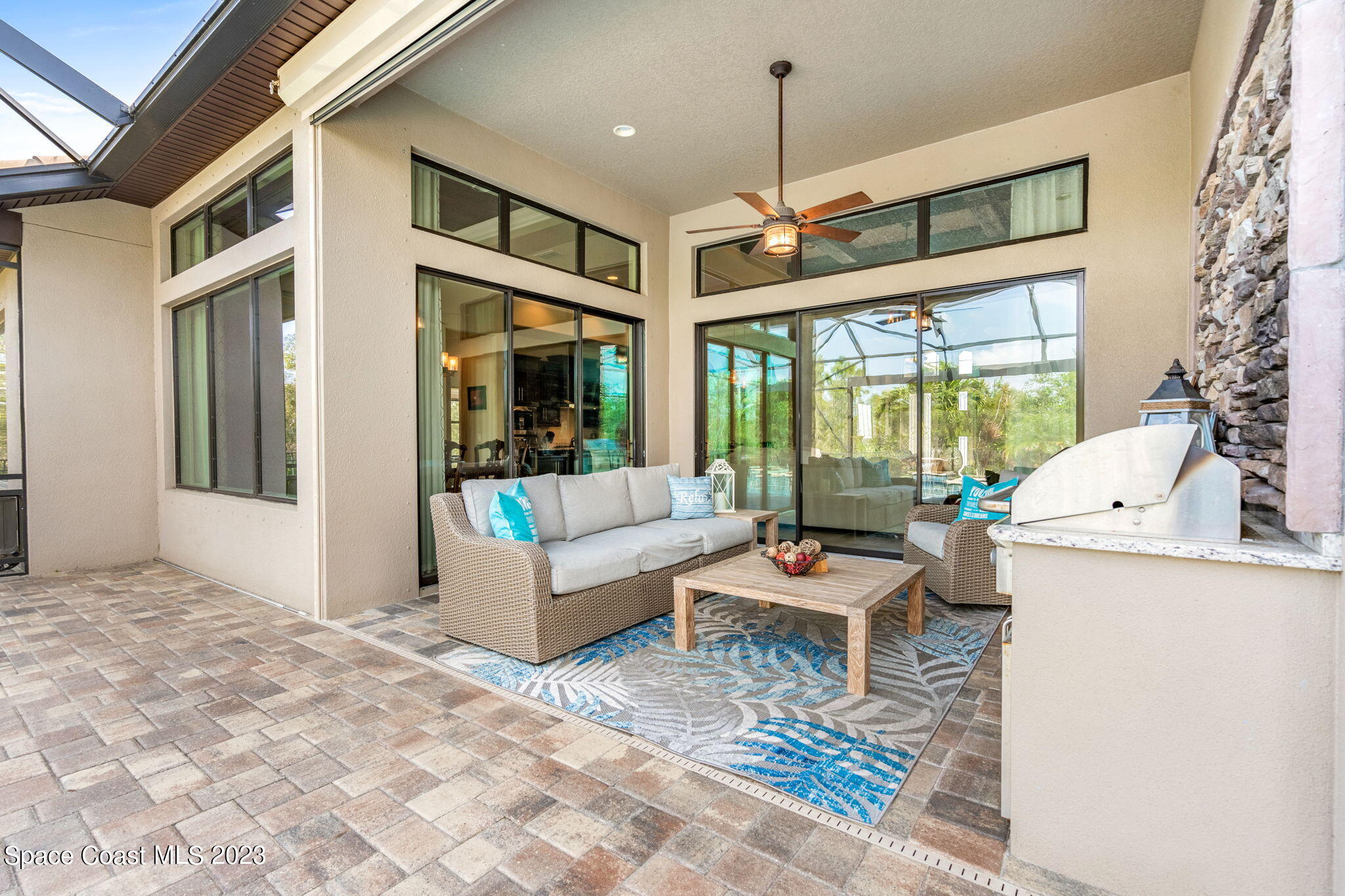 5530 Calder Drive Melbourne, FL 32940 - Photo 43 of 63 a living room with furniture and a large window
