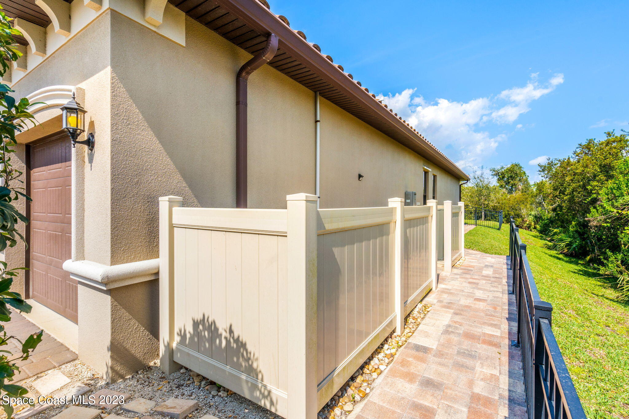 5530 Calder Drive Melbourne, FL 32940 - Photo 48 of 63 a view of a house with a yard