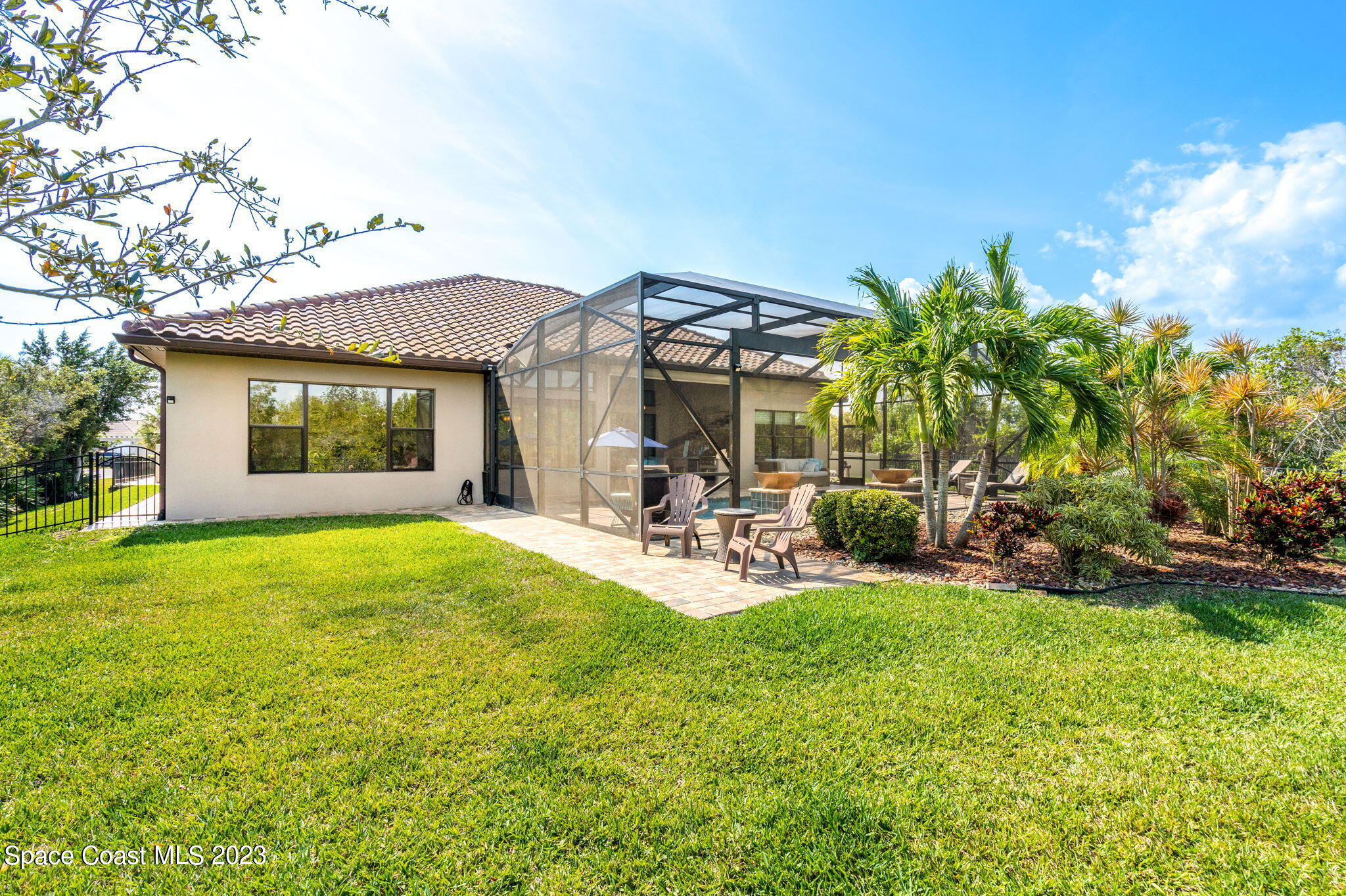 5530 Calder Drive Melbourne, FL 32940 - Photo 56 of 63 a view of a house with backyard porch and sitting area