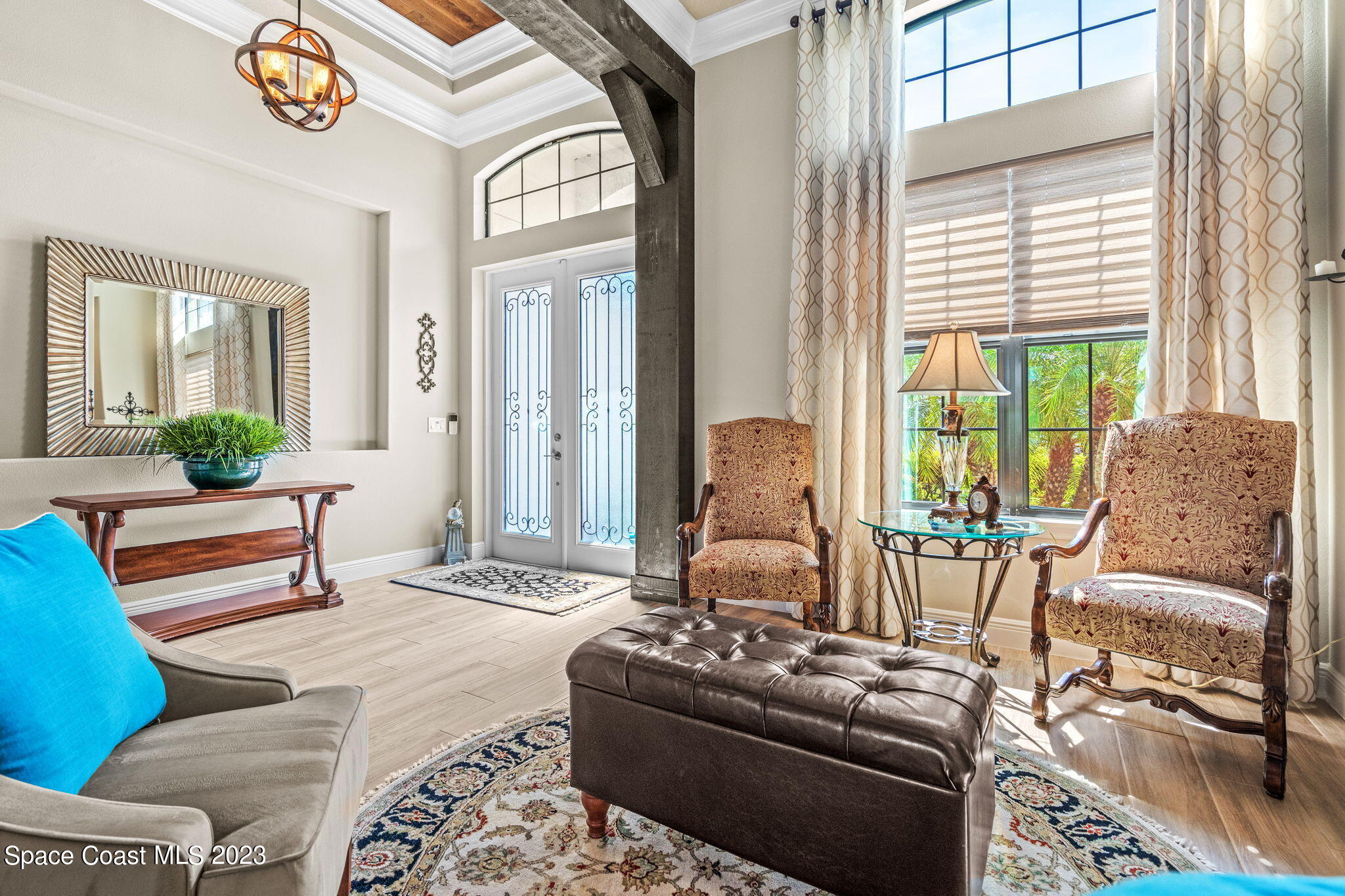 5530 Calder Drive Melbourne, FL 32940 - Photo 7 of 63 a living room with furniture and a large window