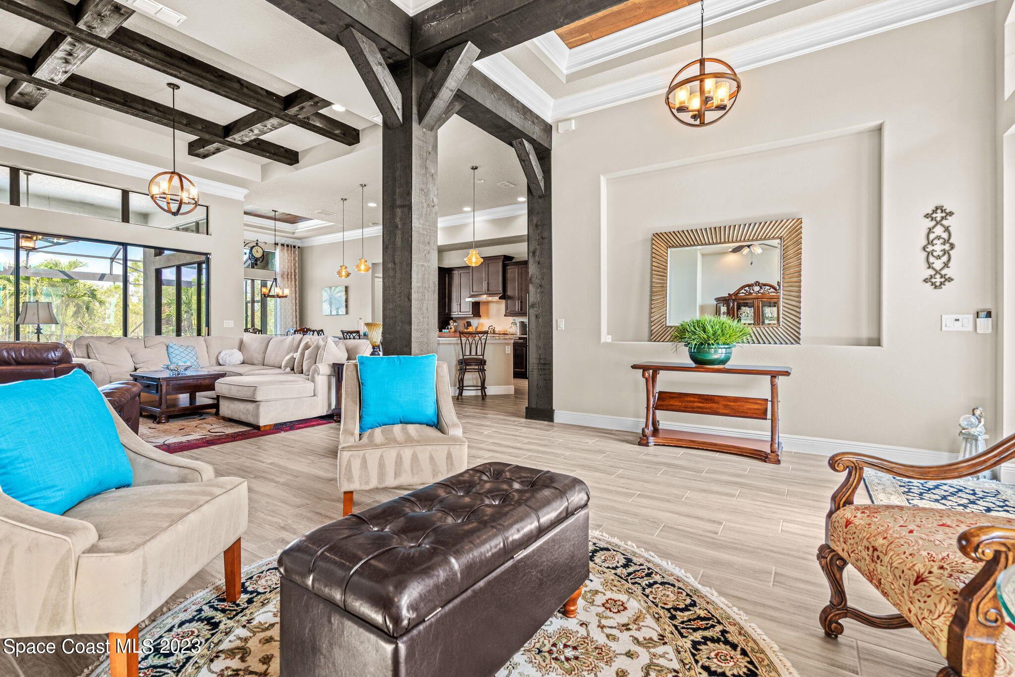 5530 Calder Drive Melbourne, FL 32940 - Photo 8 of 63 a living room with furniture and a wooden floor
