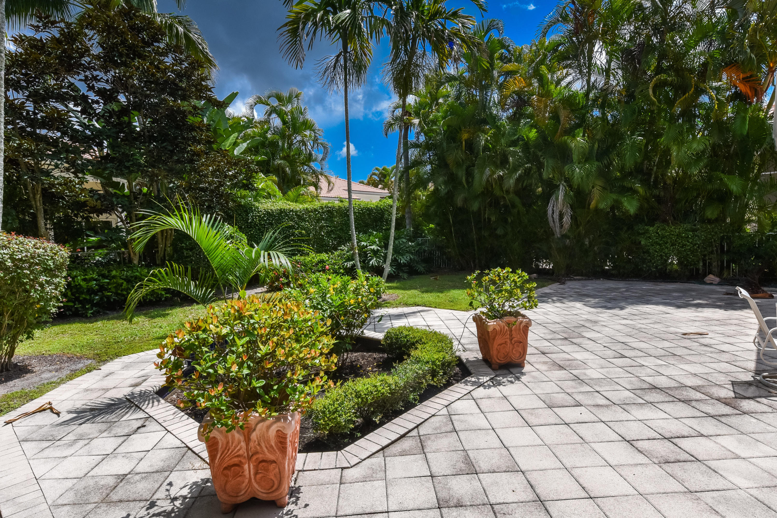 4101 Northwest 60th Circle Boca Raton, FL 33496 - Photo 23 of 45 a view of a garden with potted plants