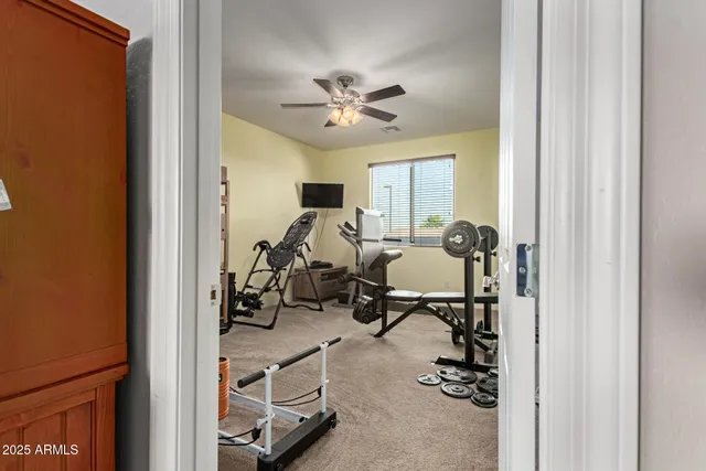 a en suite bathroom with a sink and a mirror