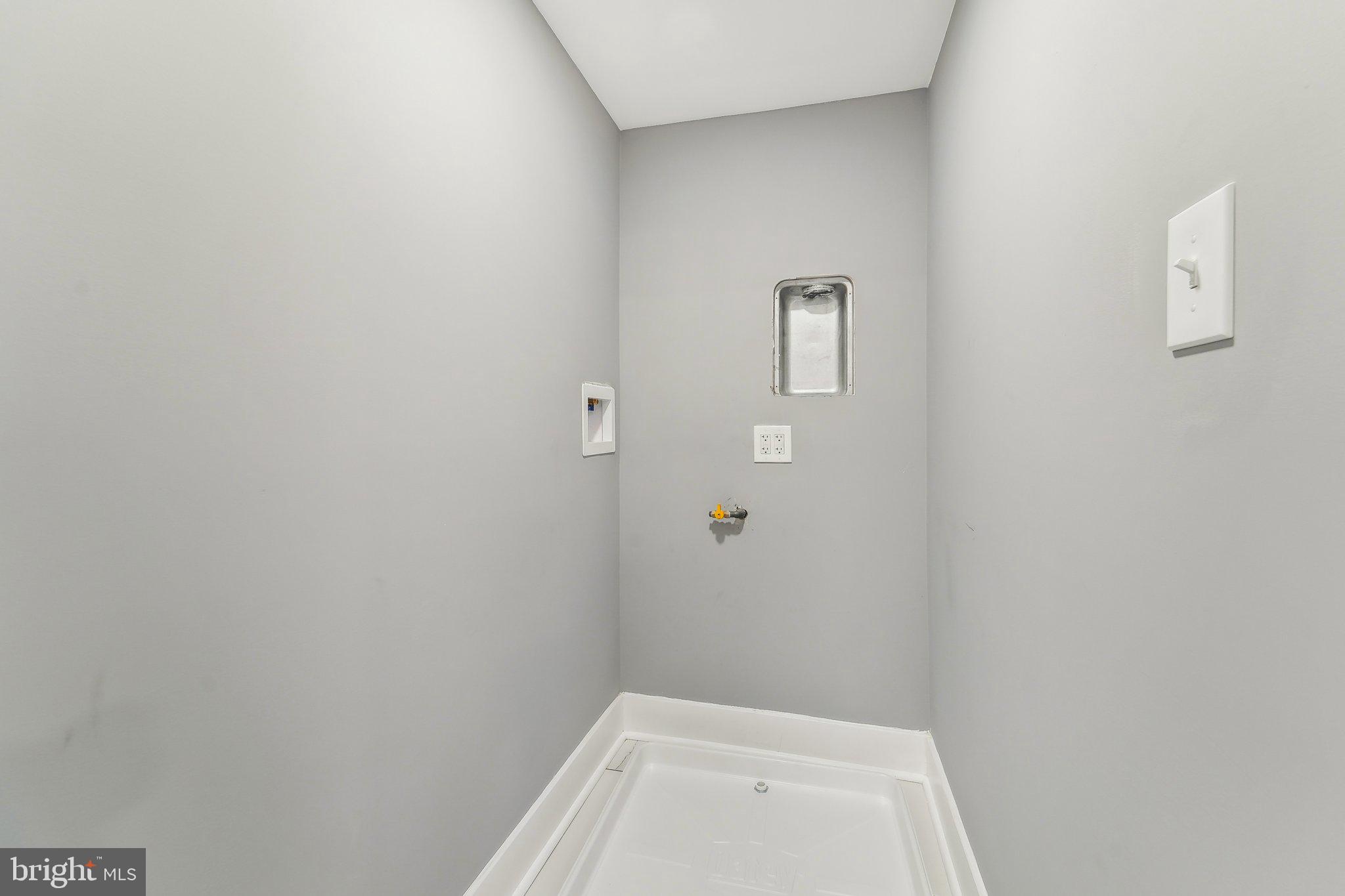 7008 Windsor Mill Road Baltimore, MD 21207 - Photo 16 of 34 a bathroom with a toilet