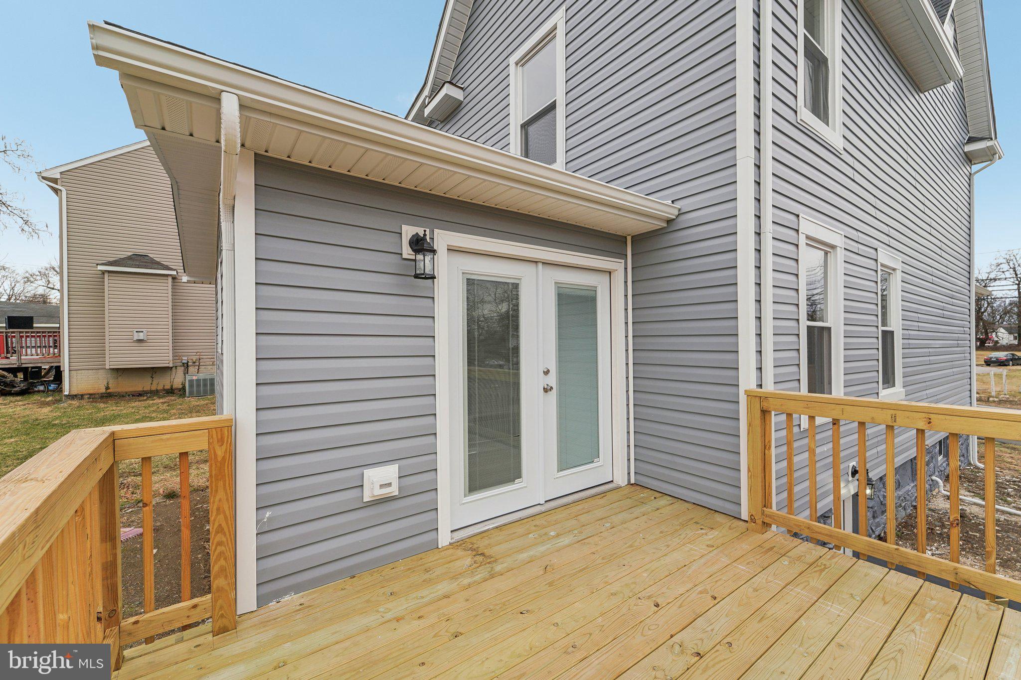 7008 Windsor Mill Road Baltimore, MD 21207 - Photo 33 of 34 a view of a house with a balcony