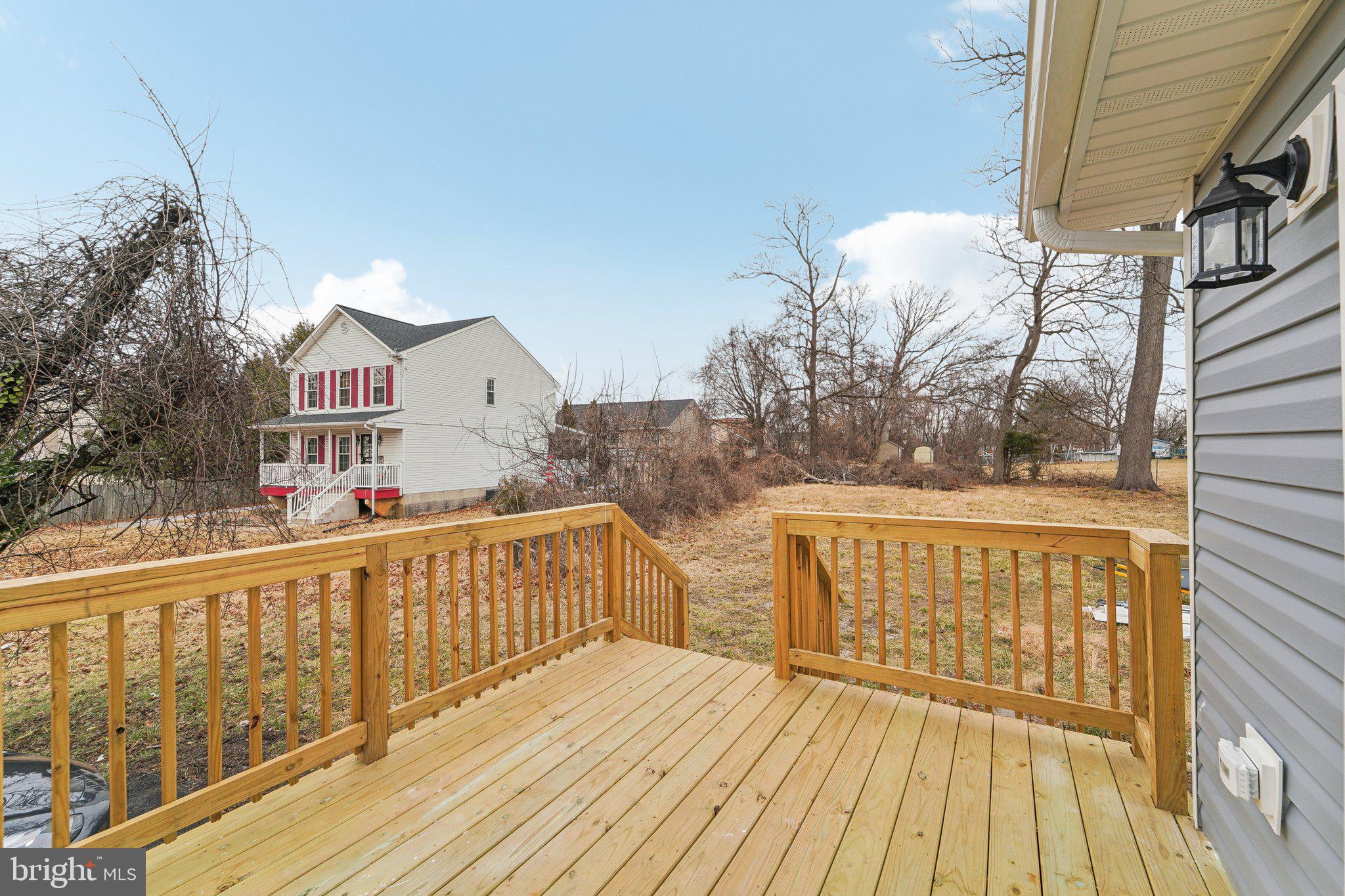 7008 Windsor Mill Road Baltimore, MD 21207 - Photo 34 of 34 a view of a house with wooden deck