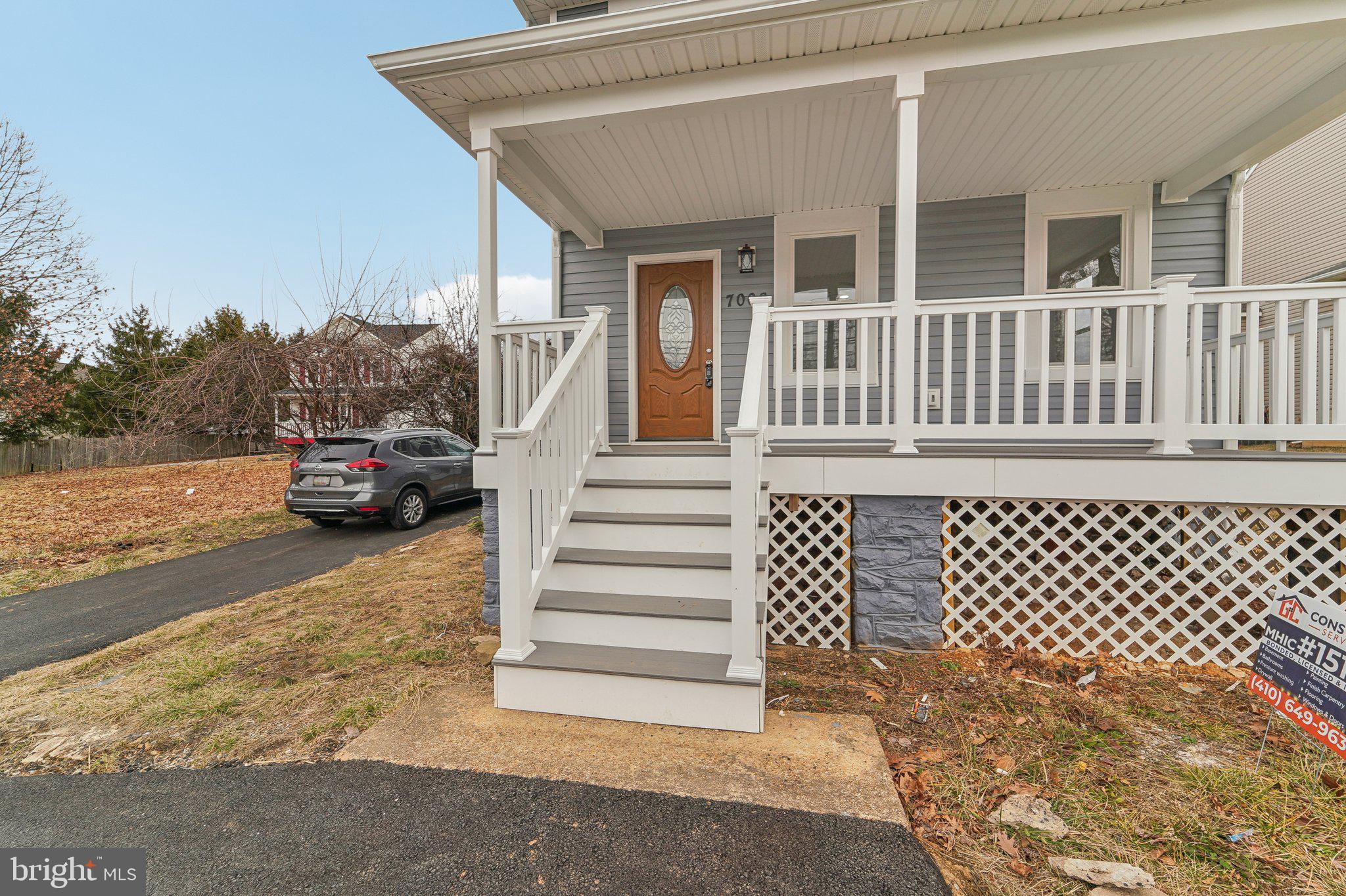 7008 Windsor Mill Road Baltimore, MD 21207 - Photo 4 of 34 a view of a house with a street