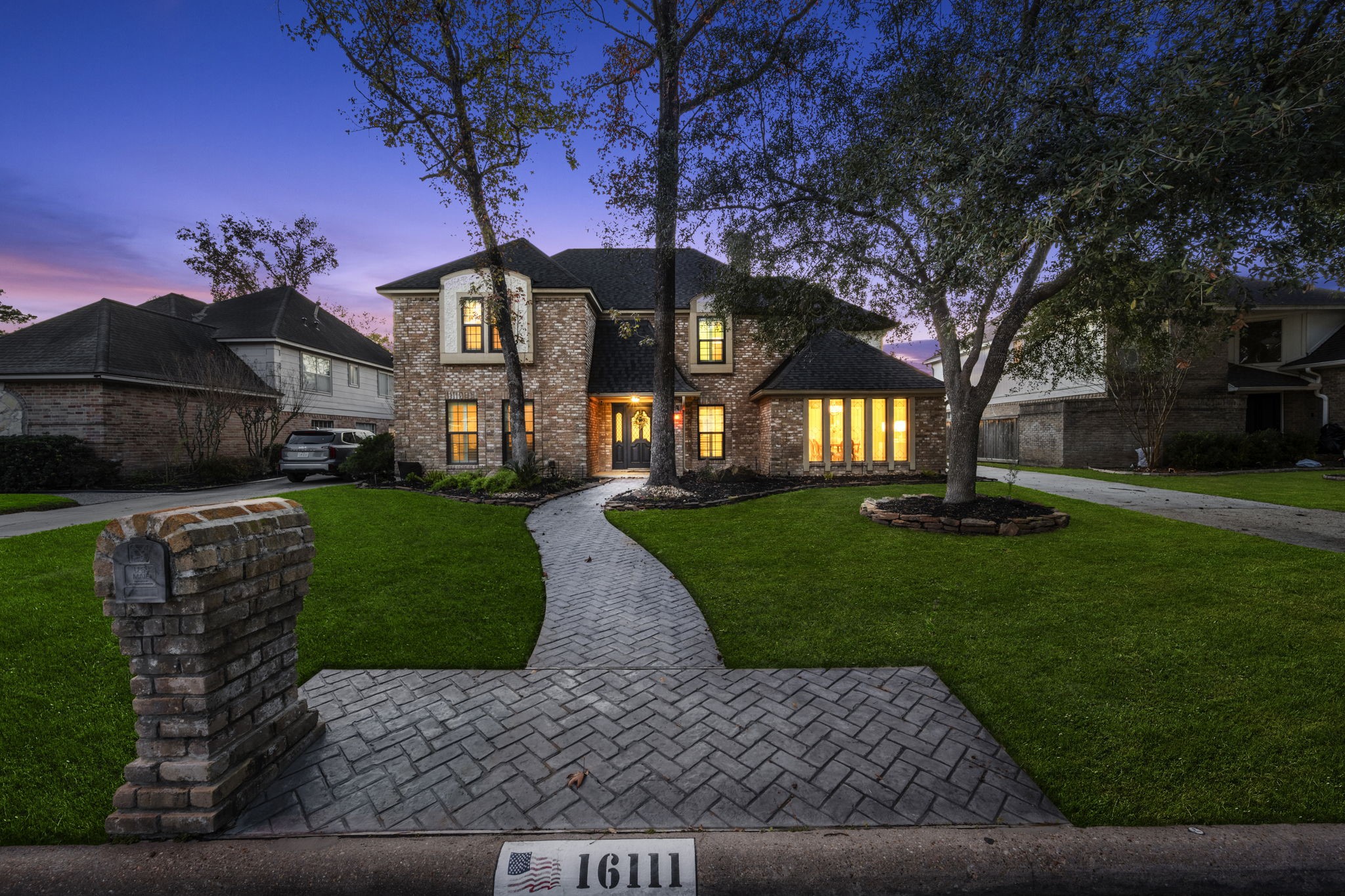 16111 Maplehurst Drive Spring, TX 77379 - Photo 1 of 30 a front view of a house with a garden