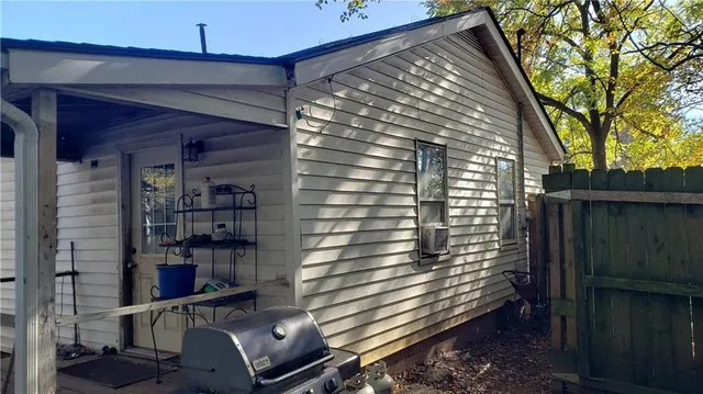 a room with a chair and tables