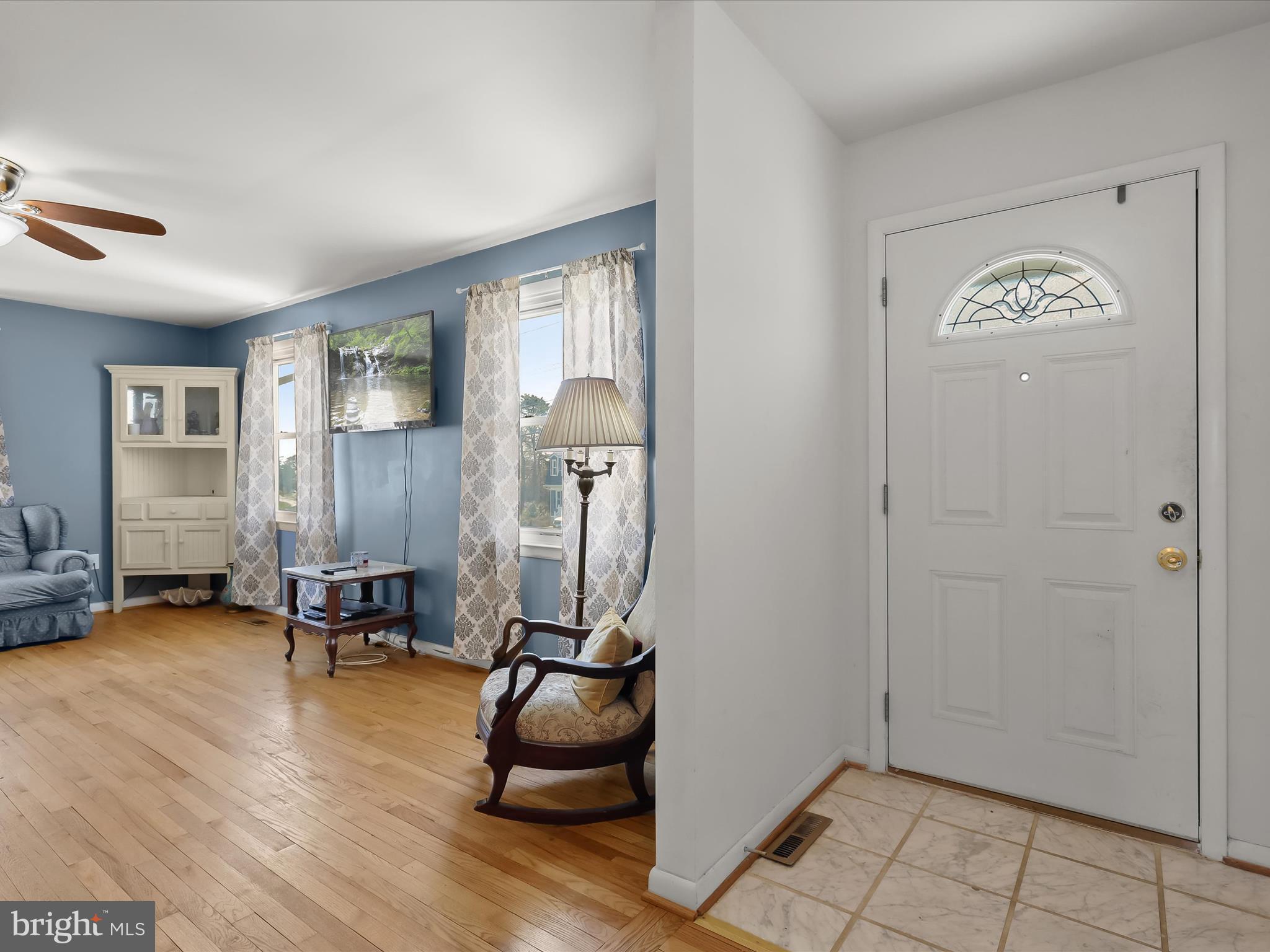 1543 South Rolling Road Halethorpe, MD 21227 - Photo 3 of 26 a view of a livingroom with furniture and a window