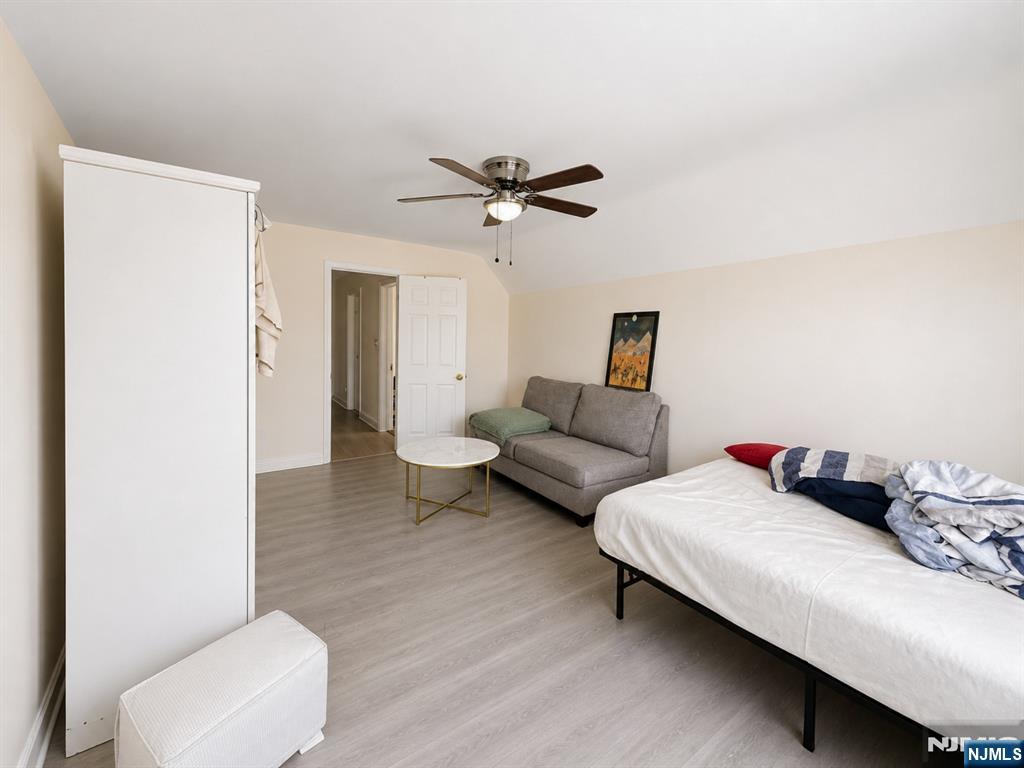 270 Pacific Street, Unit 3 Paterson, NJ 07503 - Photo 2 of 11 a living room with furniture and a rug