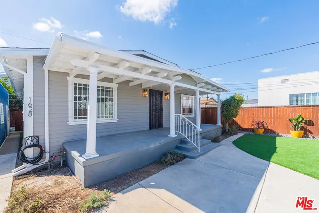 a view of an chairs and tables in the patio