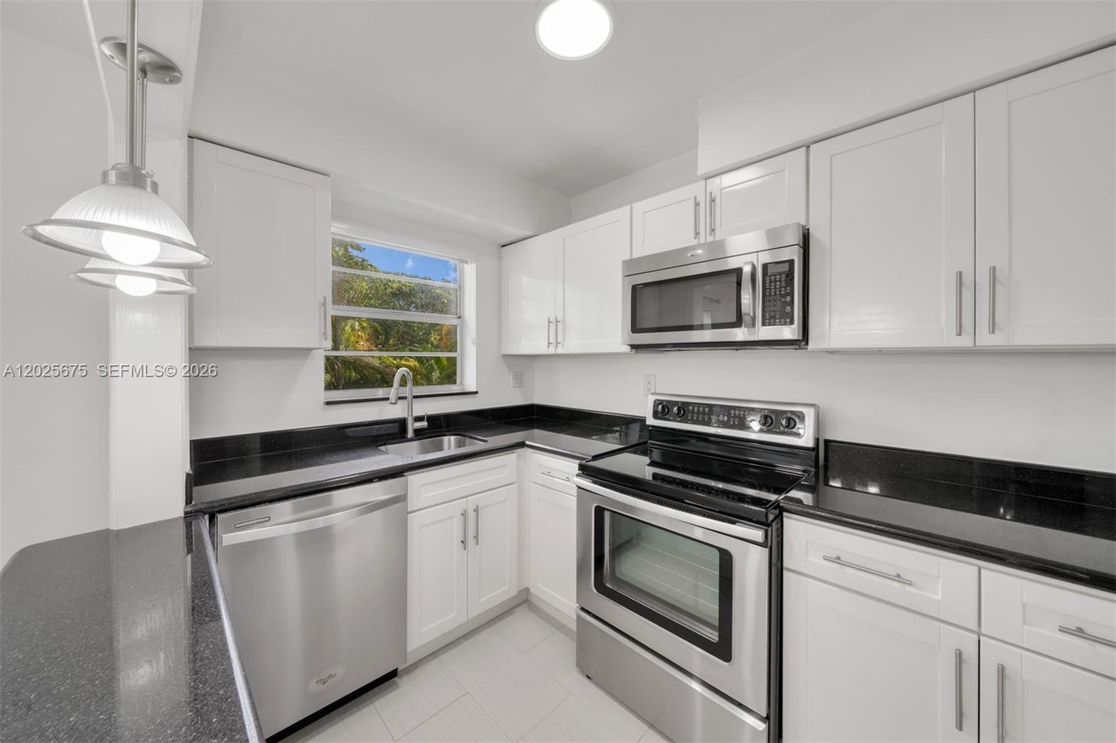 5605 Southwest 80th Street, Unit 10D Miami, FL 33143 - Photo 11 of 43 New porcelain tile flooring
