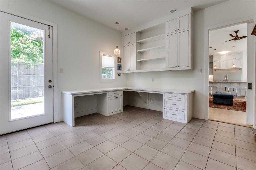 4206 Manning Lane Dallas, TX 75220 - Photo 17 of 35 a kitchen with stainless steel appliances a cabinets and window