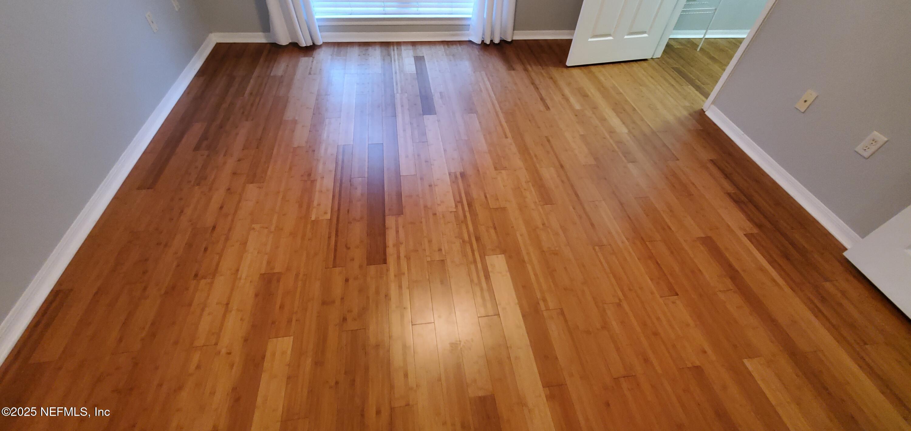 7800 Point Meadows Drive, Unit 1012 Jacksonville, FL 32256 - Photo 11 of 38 a view of entryway with wooden floor