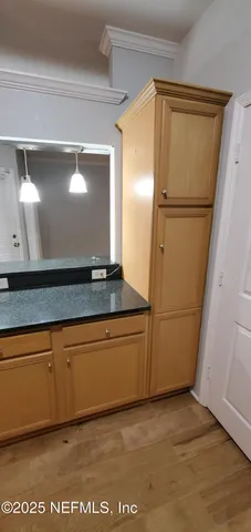 a view of a refrigerator in the kitchen