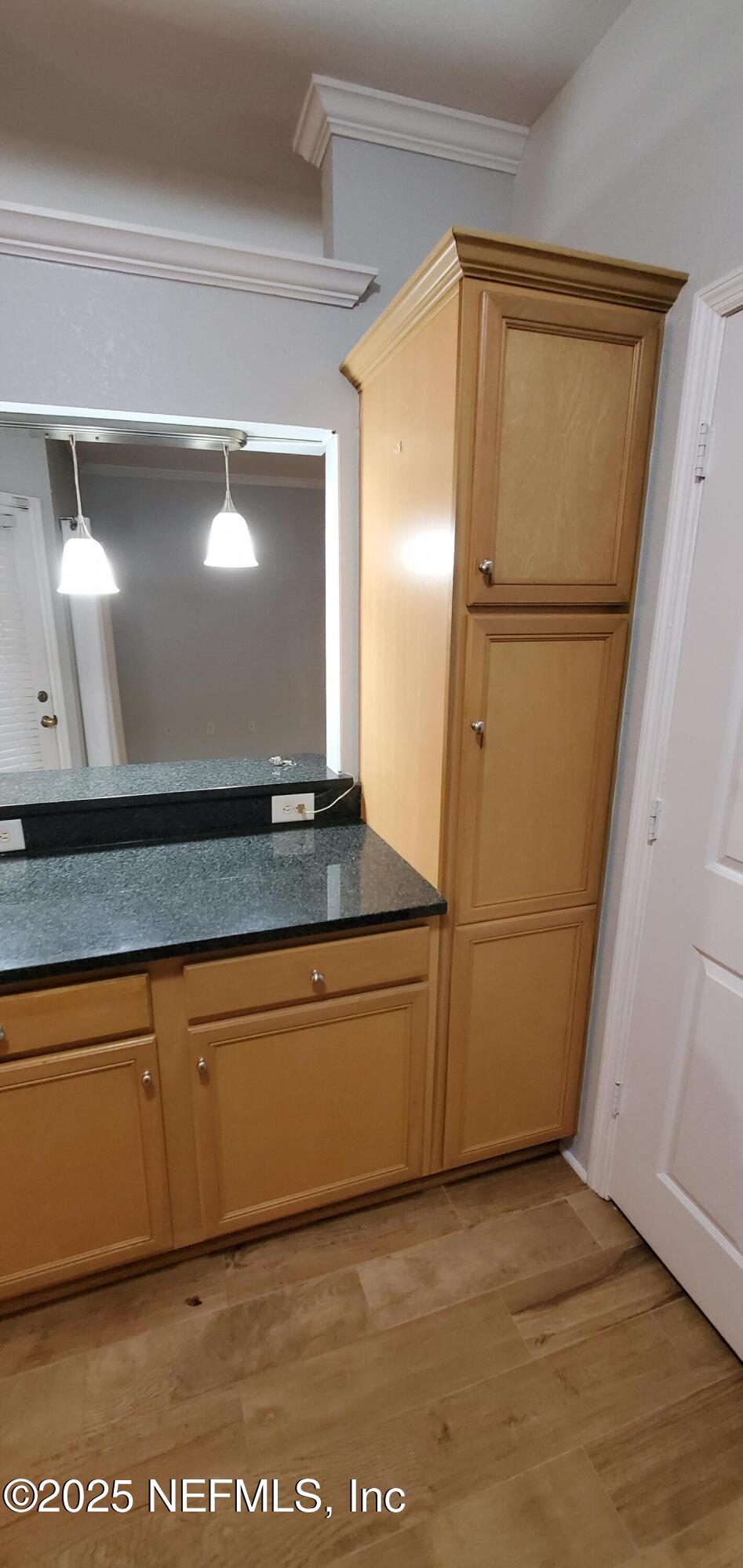 7800 Point Meadows Drive, Unit 1012 Jacksonville, FL 32256 - Photo 22 of 38 a view of a refrigerator in the kitchen