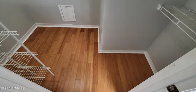 a view of kitchen and wooden floor