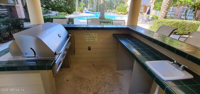 a view of balcony with furniture