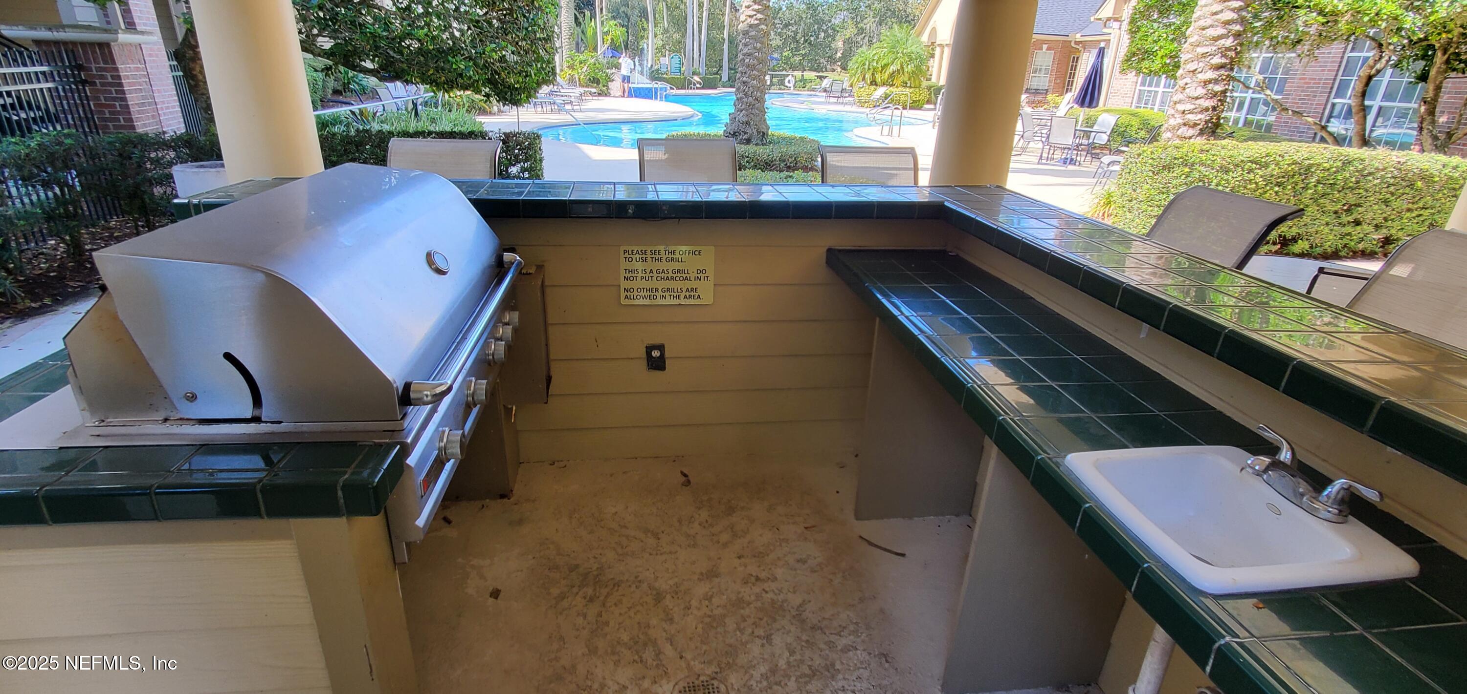 7800 Point Meadows Drive, Unit 1012 Jacksonville, FL 32256 - Photo 36 of 38 a view of balcony with furniture