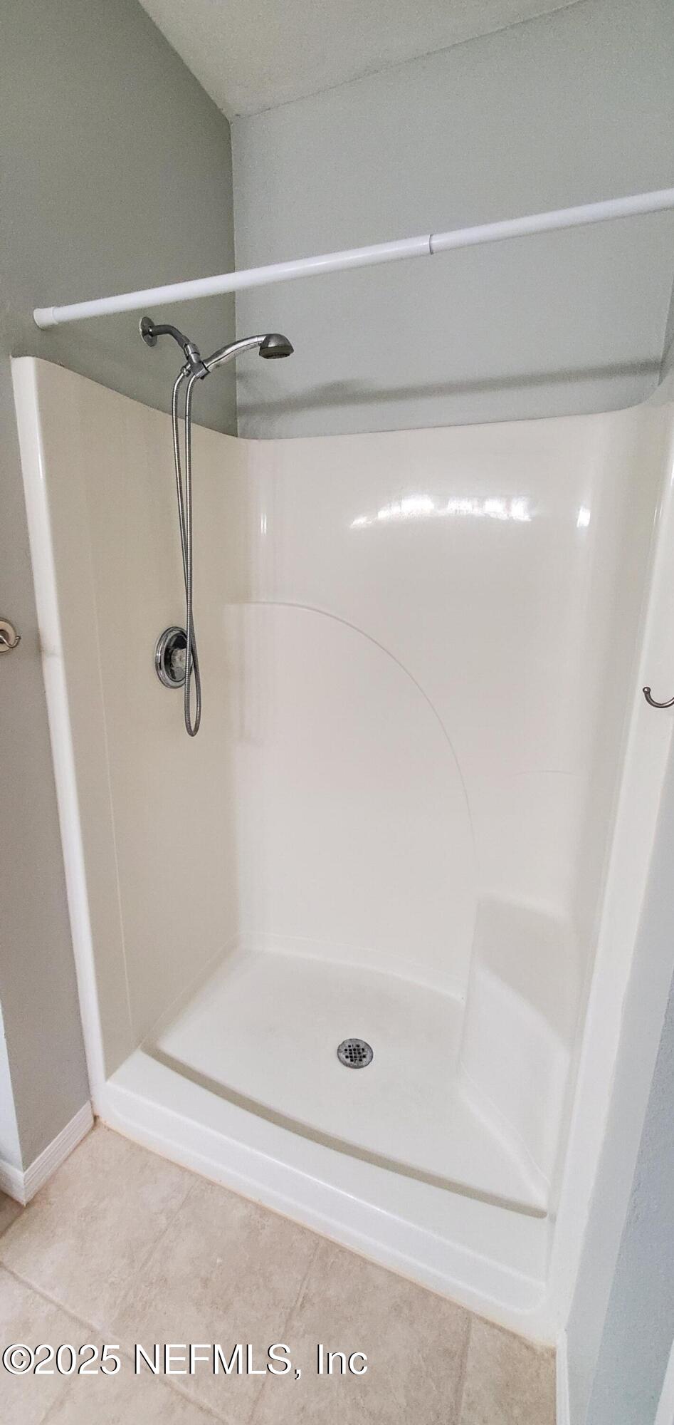 7800 Point Meadows Drive, Unit 1012 Jacksonville, FL 32256 - Photo 8 of 38 a bathroom with a shower