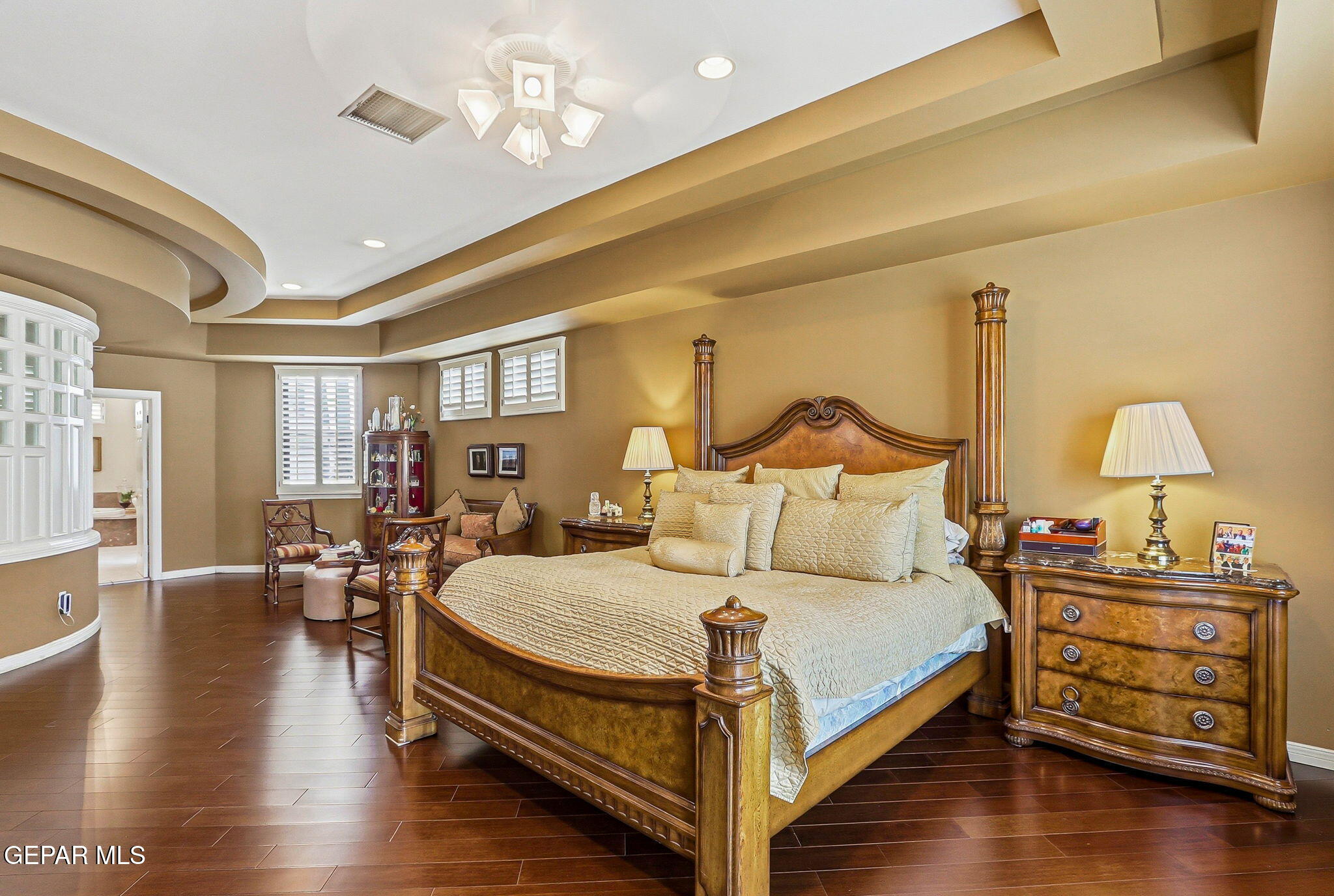 5806 Diamond Point Circle El Paso, TX 79912 - Photo 28 of 61 a bedroom with a bed and wooden floor