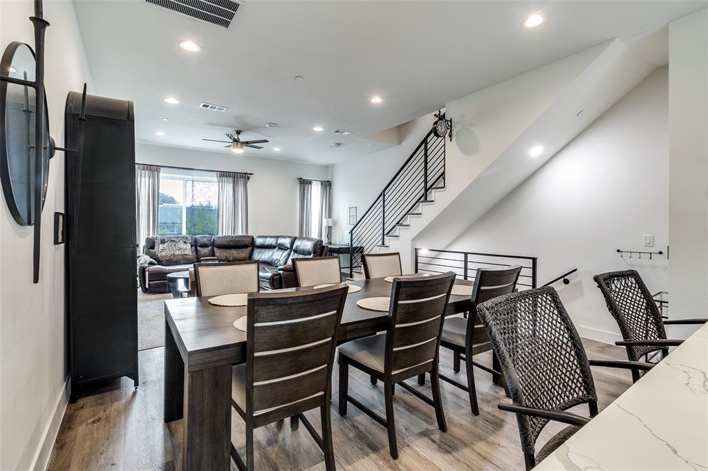 4640 Munger Avenue, Unit 104 Dallas, TX 75204 - Photo 16 of 26 a view of a dining room with furniture