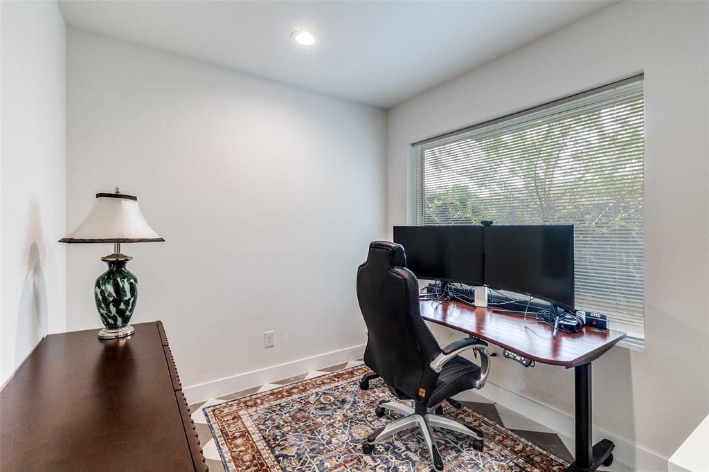4640 Munger Avenue, Unit 104 Dallas, TX 75204 - Photo 7 of 26 a view of workspace with wooden floor windows