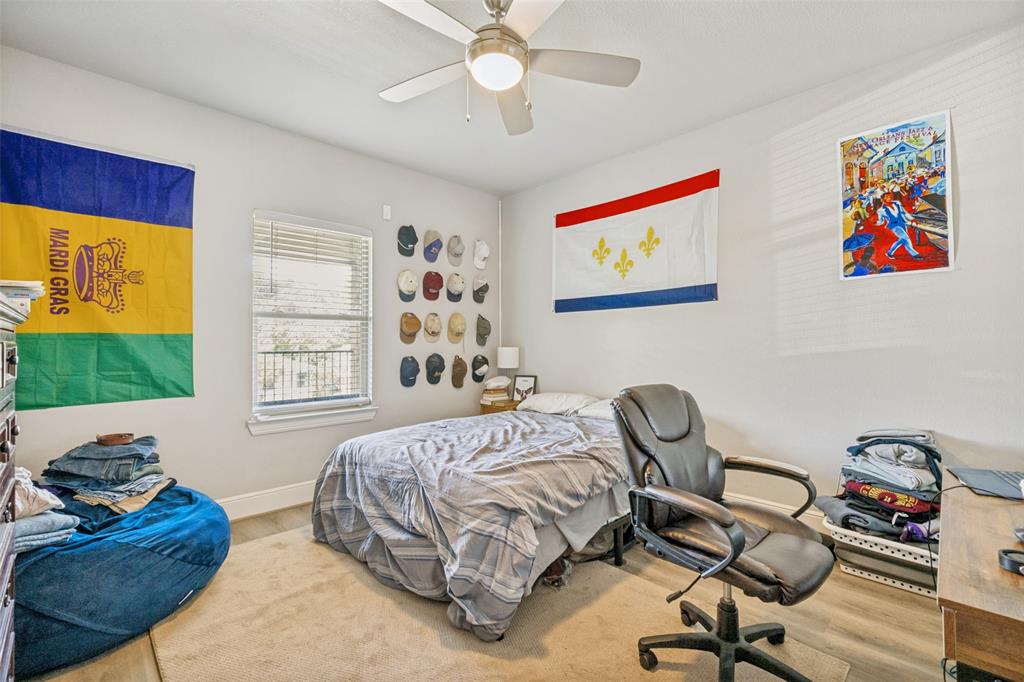 3545 Rashti Court Fort Worth, TX 76109 - Photo 20 of 36 a bedroom with a bed and a chair