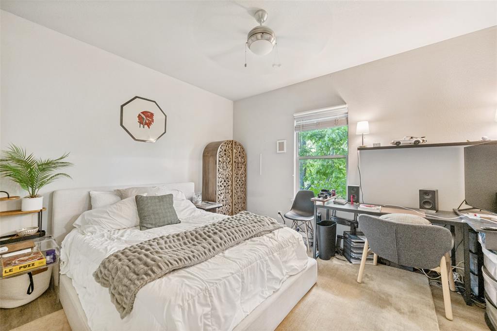 3545 Rashti Court Fort Worth, TX 76109 - Photo 22 of 36 a bedroom with a bed and a table