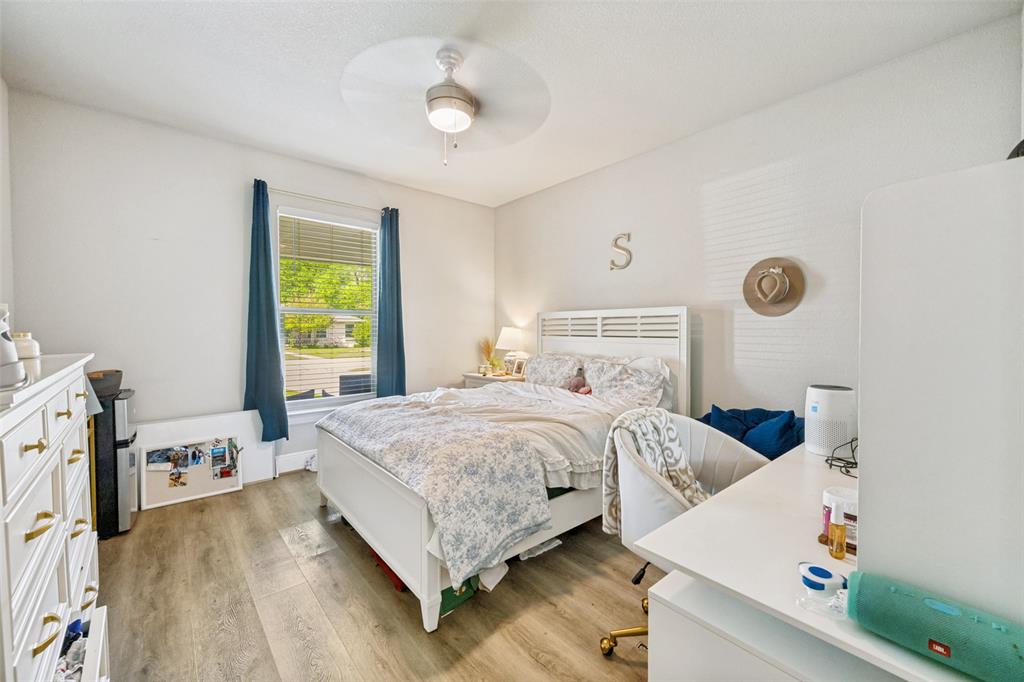 3545 Rashti Court Fort Worth, TX 76109 - Photo 32 of 36 a bedroom with a bed and a window