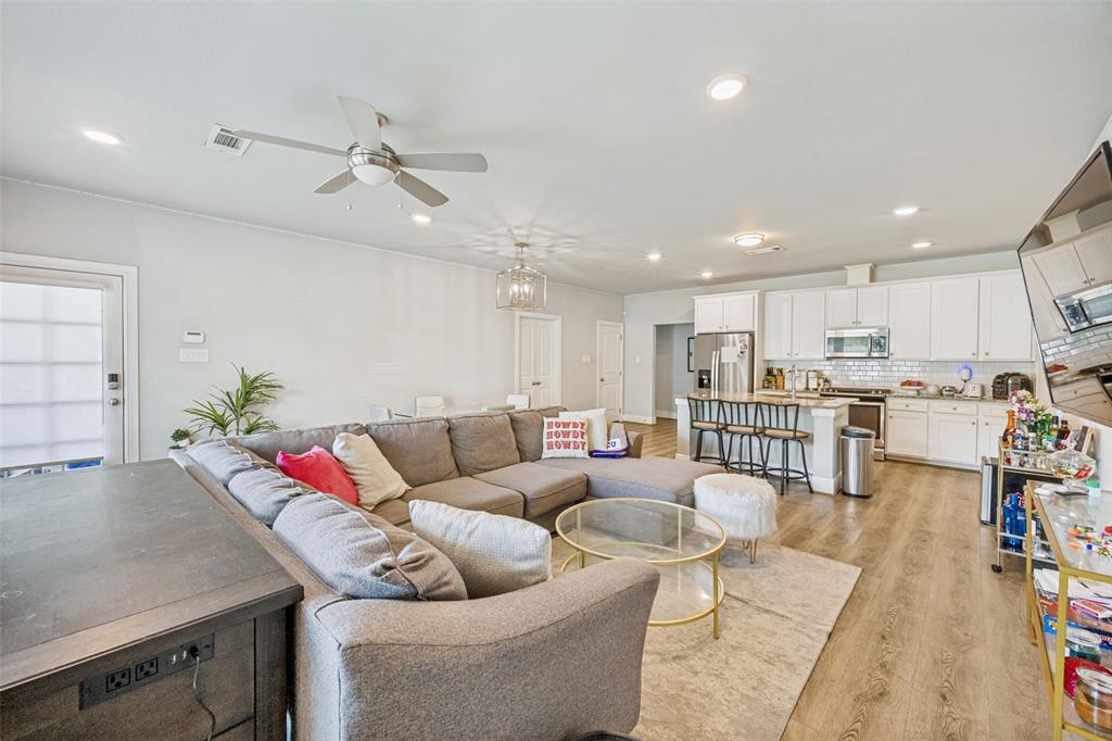 3545 Rashti Court Fort Worth, TX 76109 - Photo 5 of 36 a living room with furniture and kitchen view