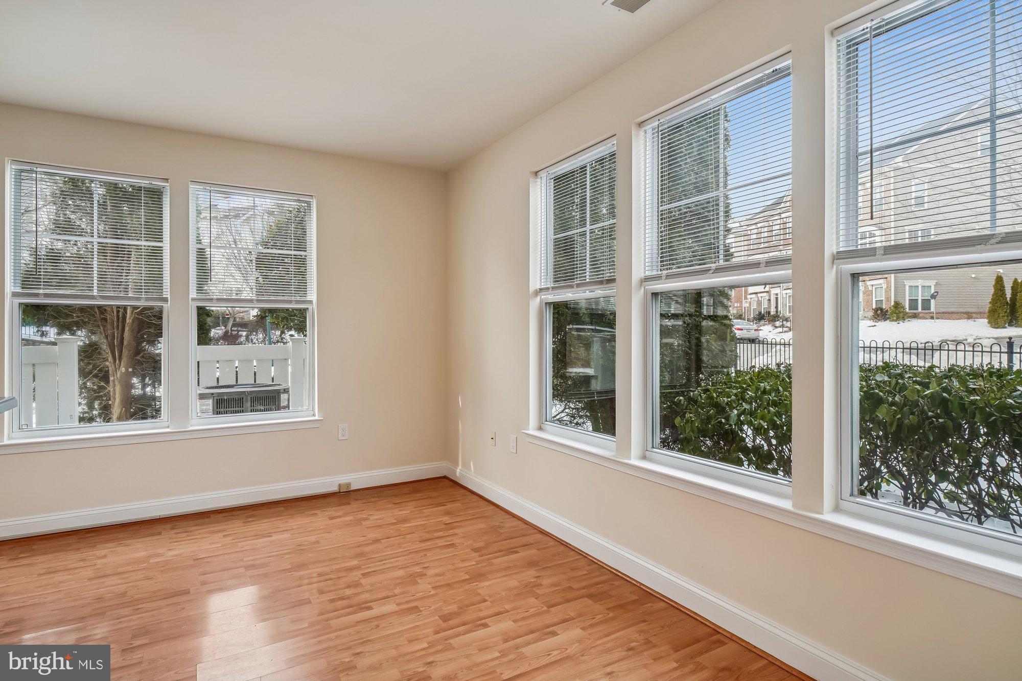 12824 Clarksburg Square Road, Unit 102 Clarksburg, MD 20871 - Photo 15 of 75 a view of an empty room with a window
