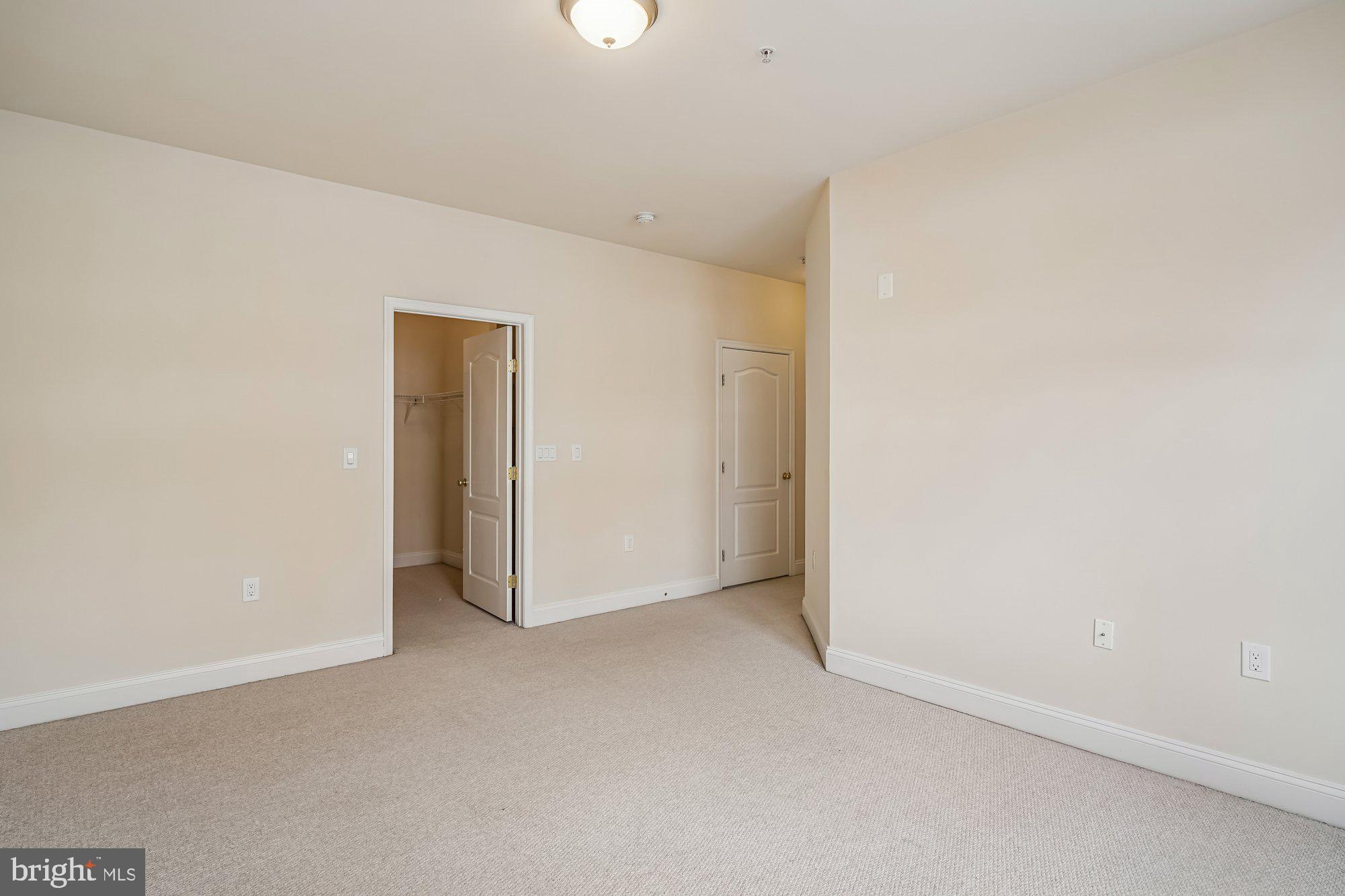 12824 Clarksburg Square Road, Unit 102 Clarksburg, MD 20871 - Photo 19 of 75 a view of an empty room