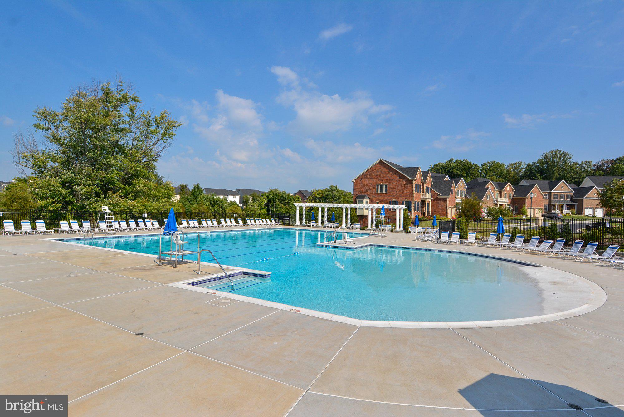 12824 Clarksburg Square Road, Unit 102 Clarksburg, MD 20871 - Photo 50 of 75 a view of swimming pool and outdoor seating