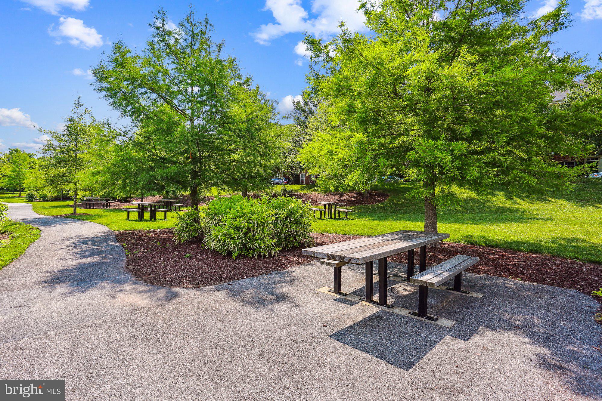 12824 Clarksburg Square Road, Unit 102 Clarksburg, MD 20871 - Photo 61 of 75 a small garden view with a seating space