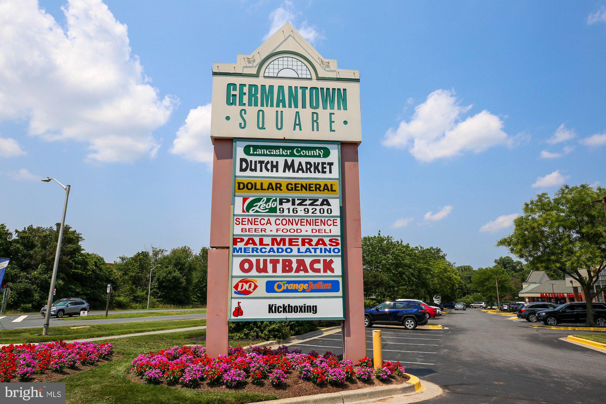 12824 Clarksburg Square Road, Unit 102 Clarksburg, MD 20871 - Photo 70 of 75 a view of sign board with buildings in the background