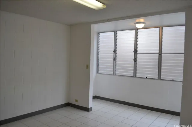 a view of a closet area with an empty room