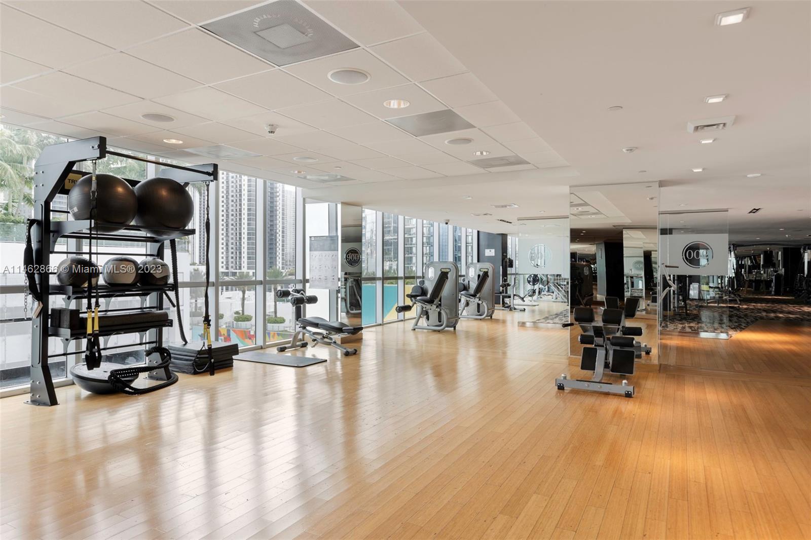 900 Biscayne Boulevard, Unit 5012 Miami, FL 33132 - Photo 26 of 27 a view of a room with gym equipment