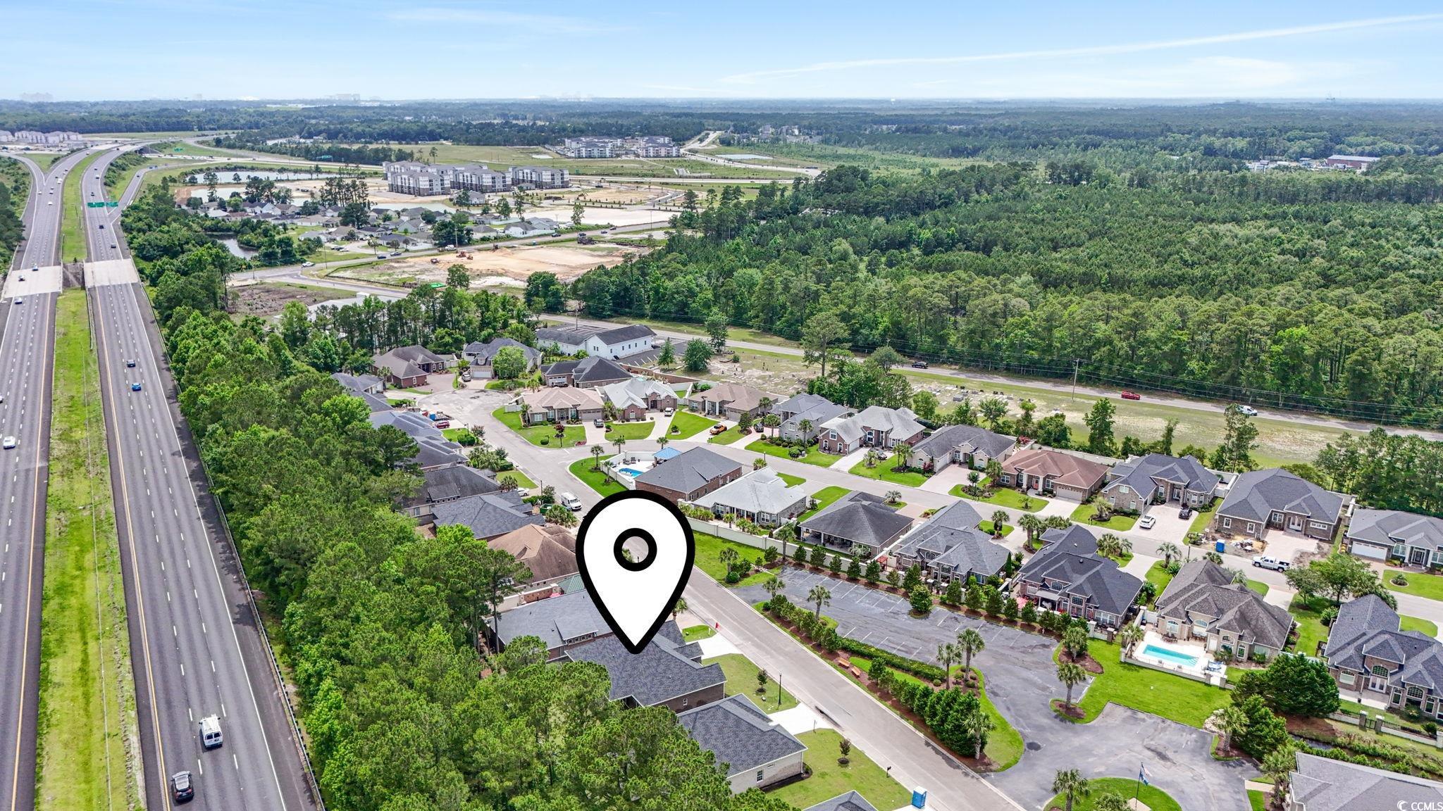 297 Waterfall Circle Little River, SC 29566 - Photo 38 of 40 Aerial overview of property's location with a major roadway and nearby suburban area