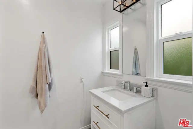 a bathroom with a shower and toilet