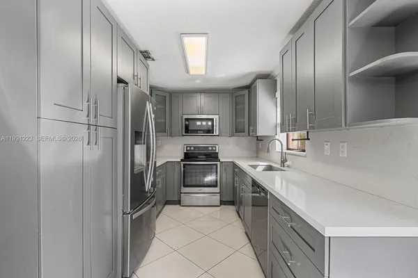 $359,000 | 6854 Northwest 173rd Drive, Unit 210, Hialeah, FL 33015