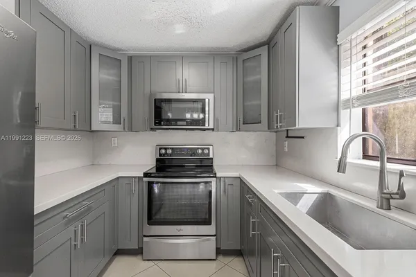 $359,000 | 6854 Northwest 173rd Drive, Unit 210, Hialeah, FL 33015